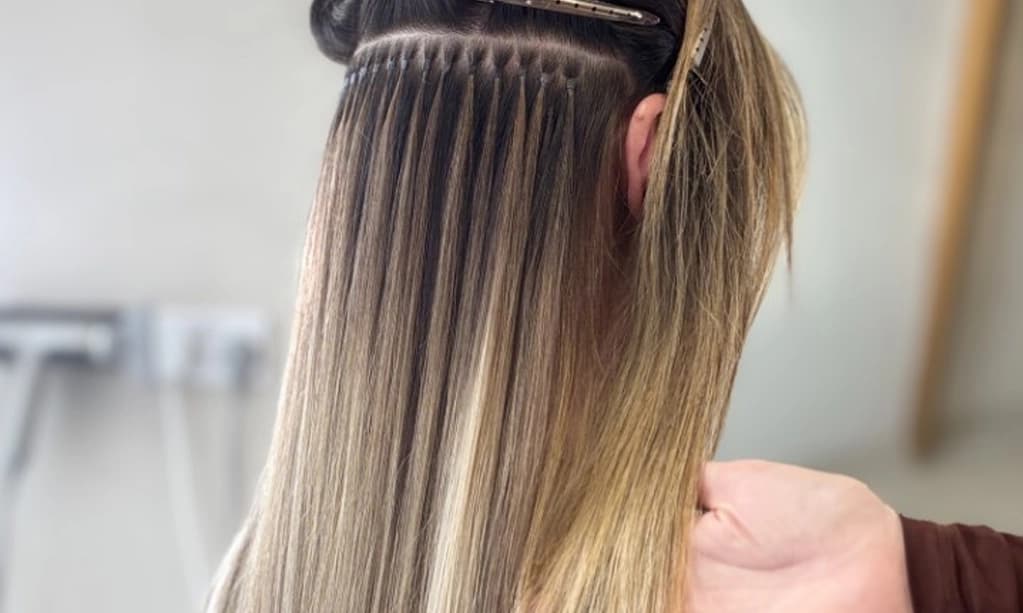 A model with perfectly colour matched hair extensions